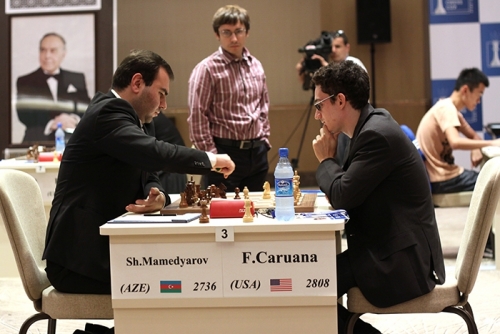 Dmitry Jakovenko observes the game between Shakhriyar Mamedyarov and Fabiano Caruana