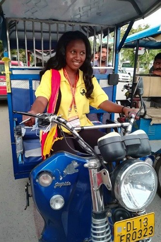 WFM Christine Namaganda on a rickshaw
