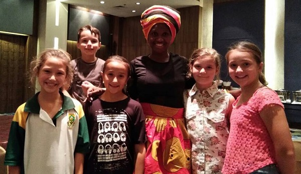 WFM Christine Namaganda with the junior team from South Africa